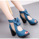 Elegant Blue Heeled Sandals Bow Accents for Sophisticated Evening Outfits image
