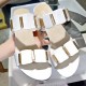 Sophisticated Gold Buckle Flat Sandals in Monochrome Palette White image