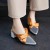 Elegance Reimagined: Grey Slingback Heels with Bold Mustard Bow