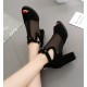 Elegant Black Mesh Heels with Celestial Charms image