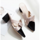 Elegance Reimagined Black Slingback Heels with Bold Cream Bow image