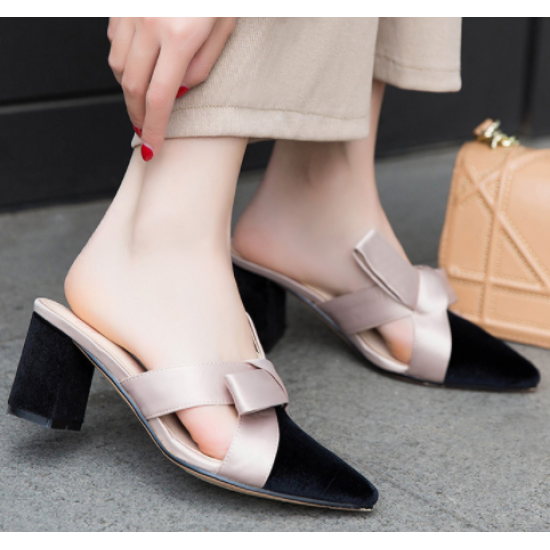 Elegance Reimagined Black Slingback Heels with Bold Cream Bow image