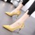 Chic Elegance Yellow Stilettos with Unique Heel Design