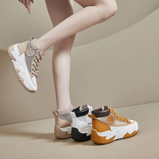 Stylish women's yellow and white high top platform sneakers with chunky sole and lace-up design