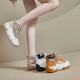 Stylish women's yellow and white high top platform sneakers with chunky sole and lace-up design