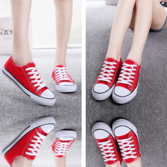 Classic Red Canvas Sneakers with Timeless White Accents image