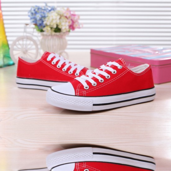 Classic Red Canvas Sneakers with Timeless White Accents image